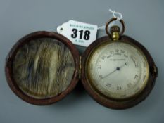 A late 19th Century silvered dial pocket barometer in a fitted case, 5 cms diameter