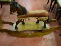 A mid Century carved wooden rocking horse, vintage style with removable rockers creating a trolley