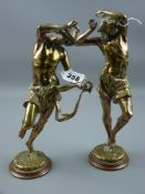 A pair of silvered bronze dancing musicians by Albert Carrier, French circa 1860, signed to the base
