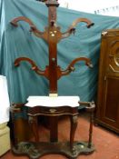 A Victorian mahogany four branch hallstand with turned wooden pegs, white serpentine marble topped