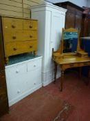 A Victorian painted pine single door wardrobe with base drawer, a painted chest of two short over