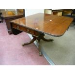 An excellent 19th Century mahogany pedestal Pembroke table, the rectangular top and twin flaps