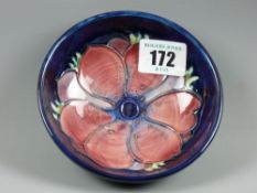 A Moorcroft Anemone blue ground shallow bowl, 11.5 cms diameter, painted and impressed marks to
