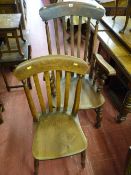 A Victorian farmhouse armchair with a near matching side chair