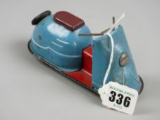 A tinplate friction driven scooter in blue and red livery, unmarked, possibly German, 13 cms long