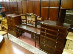 An extensive and well maintained Stag Meredew suite of bedroom furniture comprising a six drawer