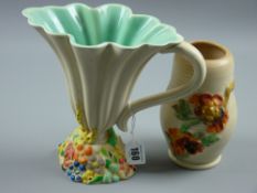 A Clarice Cliff My Garden decorated fluted jug and a Newport pottery ribbed vase with floral