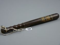 A Manchester Special Constable truncheon with gilt highlighted Manchester City crest and the name '