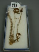 Three nine carat gold necklaces and a leaping dolphin pendant, 7 grms total and a non-gold Mizpah