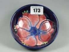 A Moorcroft Anemone blue ground shallow bowl, 11.5 cms diameter, painted and impressed marks to