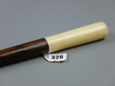 A rosewood shafted walking cane with ivory/bone grip and tip, 90 cms long