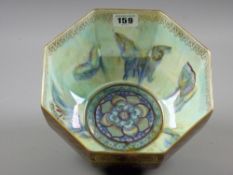 A Daisy Makeig-Jones Wedgwood lustre octagonal bowl, mottled purple exterior with butterflies, moths