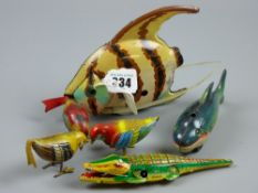 A group of mainly German clockwork tinplate toys to include a crocodile, three birds pecking, a