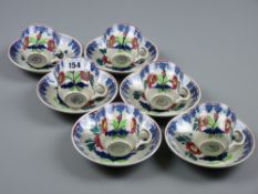 A set of six Portneuf pottery spongeware cups and saucers, stamped to the base 'Auld Heather Ware,