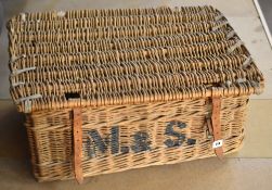 A good wicker hotel laundry basket with stained writing to the exterior 'M & S. C621'