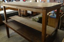 A good size lightwood refectory table with lower tier, 200cms long