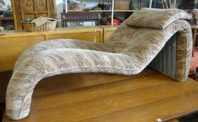 A retro Wellbeck House lounger in flecked cotton upholstery
