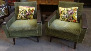 A pair of retro corduroy covered armchairs with leatherette arms, circa 1970s