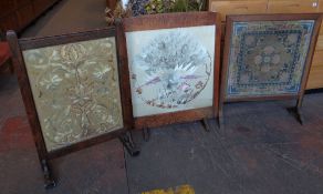Three vintage fire screens with needlework panels