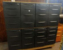 A bank of metal Castelli metal filing cabinets