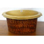 A sponged metallic farmhouse twin handled basin, 50cms wide