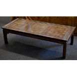 A multi wood long John coffee table in the Chinese altar style