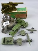 A boxed Bullock Toys long range coastal gun, an Astra cast metal toy air raid search light and seven