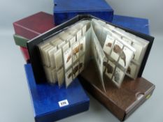 Nine albums with covers, eight containing cigarette cards for W D & H O Wills, John Player, Carreras