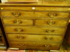 A 19th Century mahogany and line inlaid chest of three long drawers, two small middle drawers and