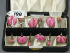 A cased set of six silver and pink enamel coffee spoons, the end of the handles decorated with