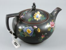 Wedgwood black basalt - an early to mid 19th Century squat form lidded teapot with bright enamel and