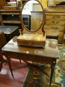 A reproduction mahogany dressing type table with two drawers and turned supports and an early