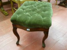 A late 19th Century mahogany button upholstered footstool, 48 x 68 cms