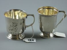A hallmarked silver christening mug, London 1947, 3.5 troy ozs, 7.5 cms high, engraved to one side
