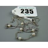 A delicate silver necklace with six pearls, 3.9 grms