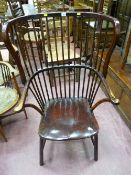 An early 20th Century spindleback Norfolk type armchair, 114 x 64 cms