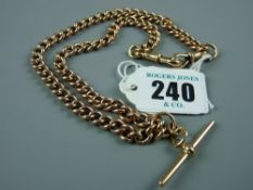A nine carat gold curb link watch chain with central T-bar in fifteen carat gold, 43 cms approximate