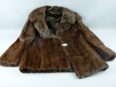 A lady's vintage half length fur jacket, approximately 64 cms long, size unknown