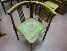 An Edwardian inlaid mahogany corner chair, boxwood line inlaid back, upholstered diamond shaped seat