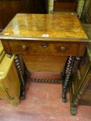 A late Victorian mahogany work table with single drawer and slide-out well on twist supports with
