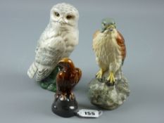 Three ceramic bird decanters, Royal Doulton snow owl for Whyte & Mackay, Beswick kestrel for