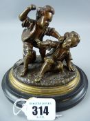 A bronze fighting boys group, a well cast patinated bronze group of two young boys fighting with a