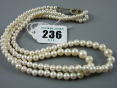 A double strand pearl necklace of graduated pearls with silver clasp, 34 grms gross