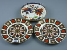 Two Royal Crown Derby '1128' pattern plates, 21.5 cms diameter approximately in a gilt highlighted