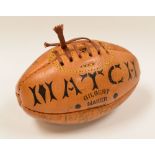 A MINIATURE LEATHER GILBERT RUGBY BALL SIGNED BY WALES & IRELAND players from the 1980s including
