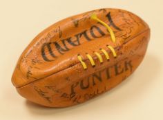 A LEATHER ROLAND 'PUNTER' LACED RUGBY BALL SIGNED BY 1971 BRITISH LIONS TOURING SIDE & THEIR NEW