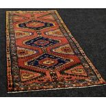 A PERSIAN RUNNER in all over traditional design, 269 x 107 cms