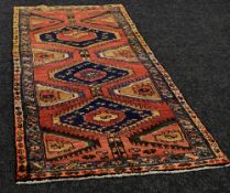 A PERSIAN RUNNER in all over traditional design, 269 x 107 cms