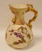 ROYAL WORCESTER BLUSH-IVORY JUG the body with gilded and painted flowers on branches and having a