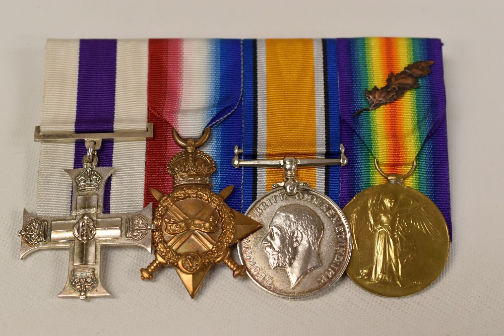 FIRST WORLD WAR MILITARY CROSS FOUR MEDAL GROUP with oak leaf (later ribbons) to Capt T R